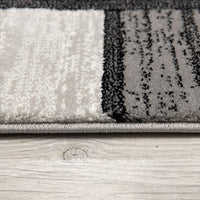 2’ x 4’ Gray Asymmetric Blocks Area Rug