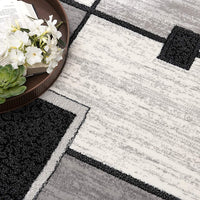 2’ x 4’ Gray Asymmetric Blocks Area Rug