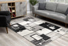 4’ x 6’ Gray Asymmetric Blocks Area Rug