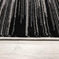 8’ x 11’ Black Transitional Striped Area Rug