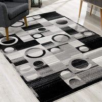 7’ x 9’ Gray Blocks and Rings Area Rug