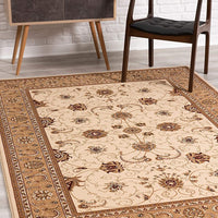 2’ x 4’ Cream and Tan Ornate Border Area Rug