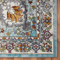 5’ x 8’ Blue and Ivory Center Medallion Area Rug