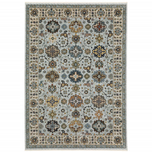 6' X 9' Blue Beige Grey Green Yellow And Rust Oriental Power Loom Stain Resistant Area Rug With Fringe