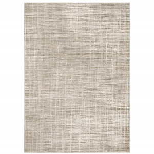 5' X 8' Beige Grey Ivory Tan And Brown Abstract Power Loom Stain Resistant Area Rug