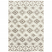 8' X 11' Ivory And Brown Geometric Shag Power Loom Stain Resistant Area Rug