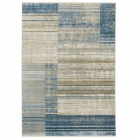 10' X 13' Blue Dark Blue Teal Grey Ivory Beige And Tan Geometric Power Loom Stain Resistant Area Rug With Fringe