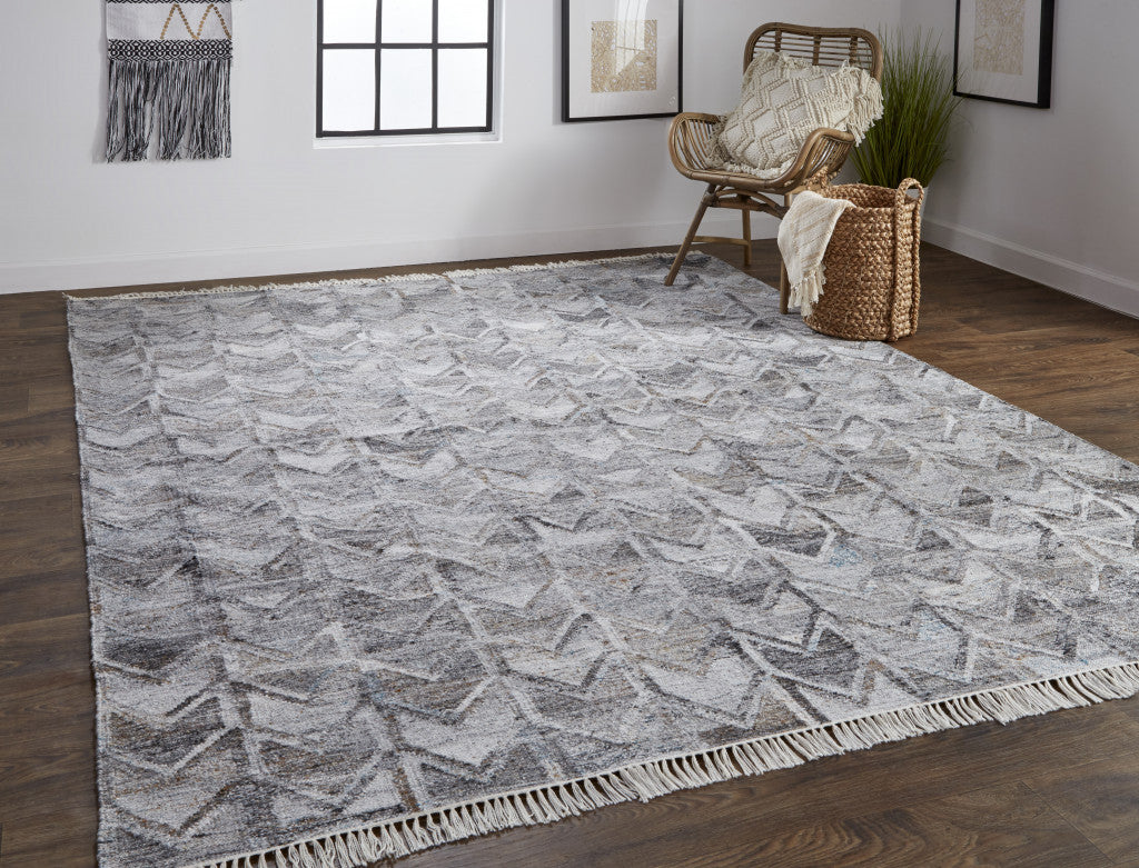 2' X 3' Gray Silver And Taupe Geometric Hand Woven Stain Resistant Area Rug With Fringe