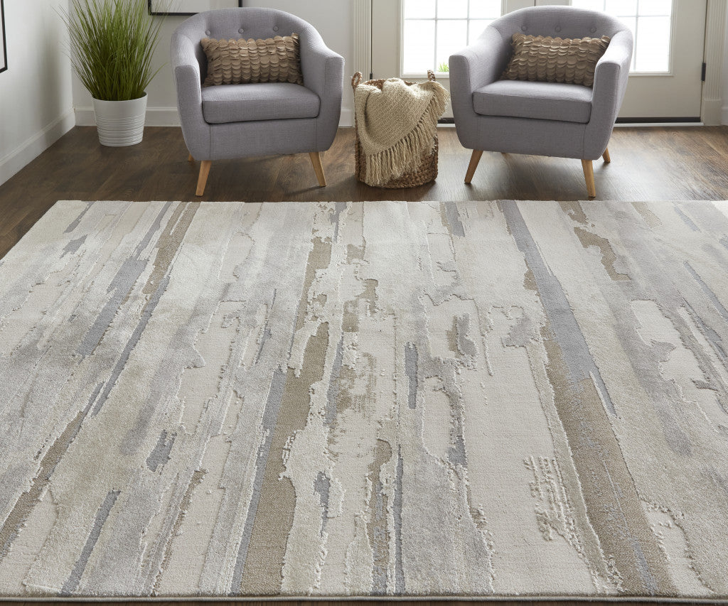 5' X 8' Ivory Tan And Brown Abstract Power Loom Distressed Stain Resistant Area Rug