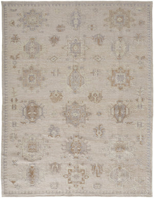 5' X 8' Tan And Brown Floral Hand Knotted Stain Resistant Area Rug