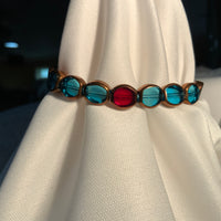 Turquoise with Antique Brass & One Red Bead, Beaded Bracelet